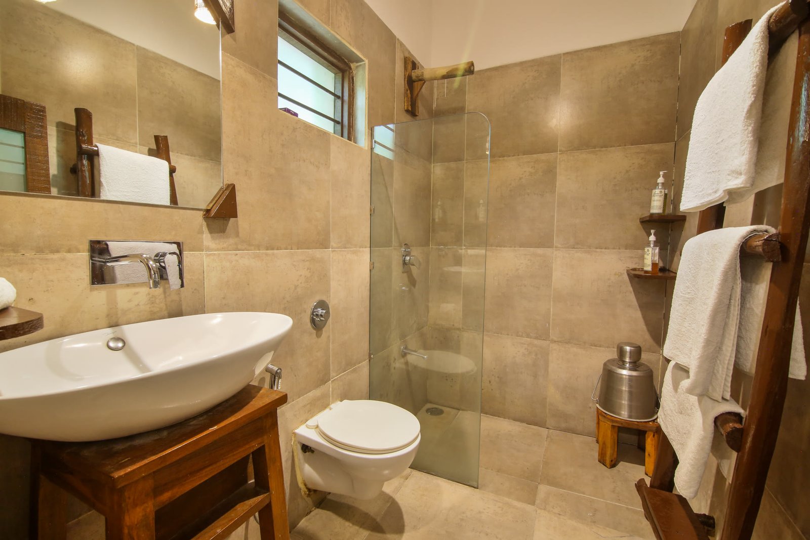 Comfortable bedroom with modern amenities in cottage room